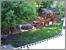 This is our backyard, as seen from the balcony outside our bedroom.  We're in the process of adding a little, bricked patio area, which explains the bit of excavated soil on the deck.
