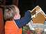 Connor constructing a gingerbread house