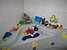 Our maid 'stages' the bathroom toys in a most amusing way.  Note Spider-Man taking a ride in the whale.